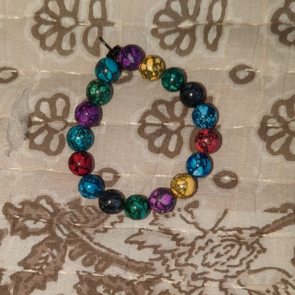Multi-colored 10.mm.round Beads.